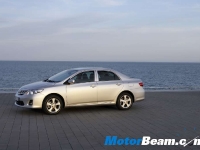 thumbs 2011 Toyota Corolla 10 photo