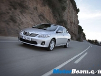 thumbs 2011 Toyota Corolla 17 photo