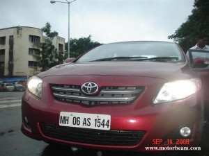 corolla altis maroon 300x225 photo
