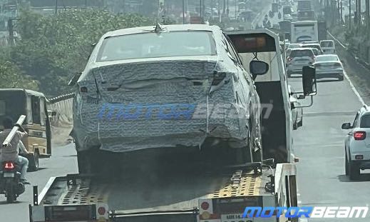 Test car loaded on truck