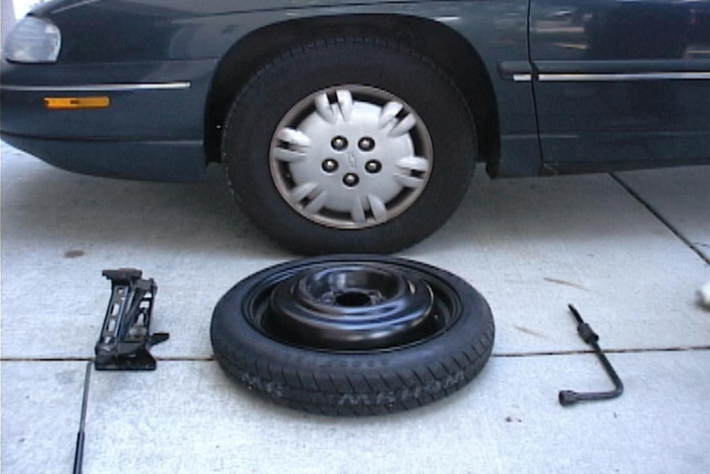 How To Flat Tyre Place Spare