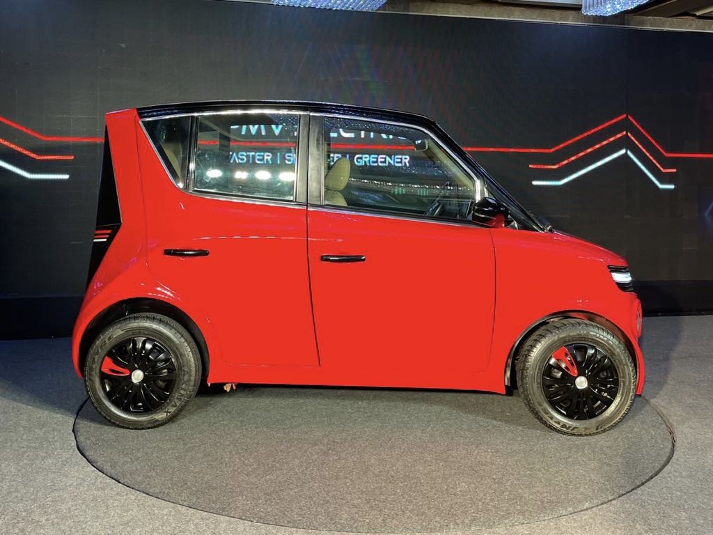 Side profile of the red electric car