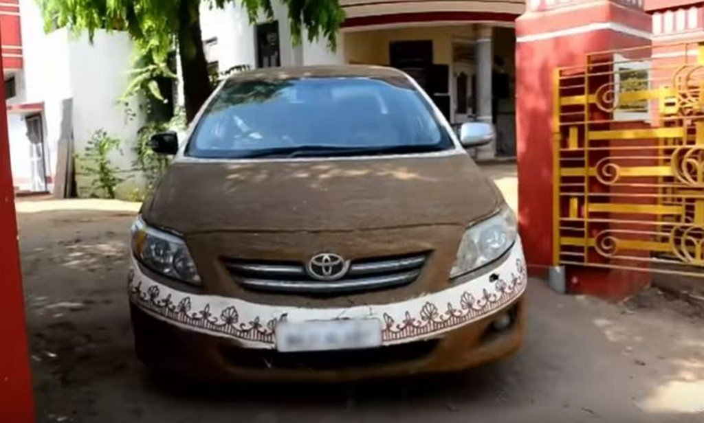 Toyota Corolla In Cow Dung